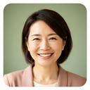 笑顔で話す田中真由美さんのプロフィール写真